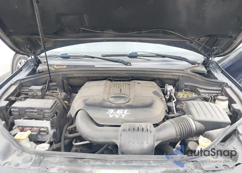 2013 Jeep Grand Cherokee Overland из США, поврежденный, VIN 1C4RJECG8DC588115